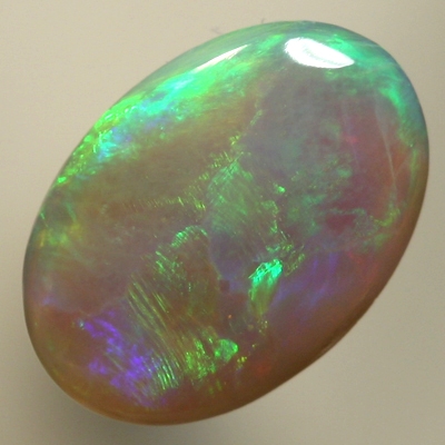 SOLID SEMI BLACK OPAL Large rolling flashes from orange to green with purple